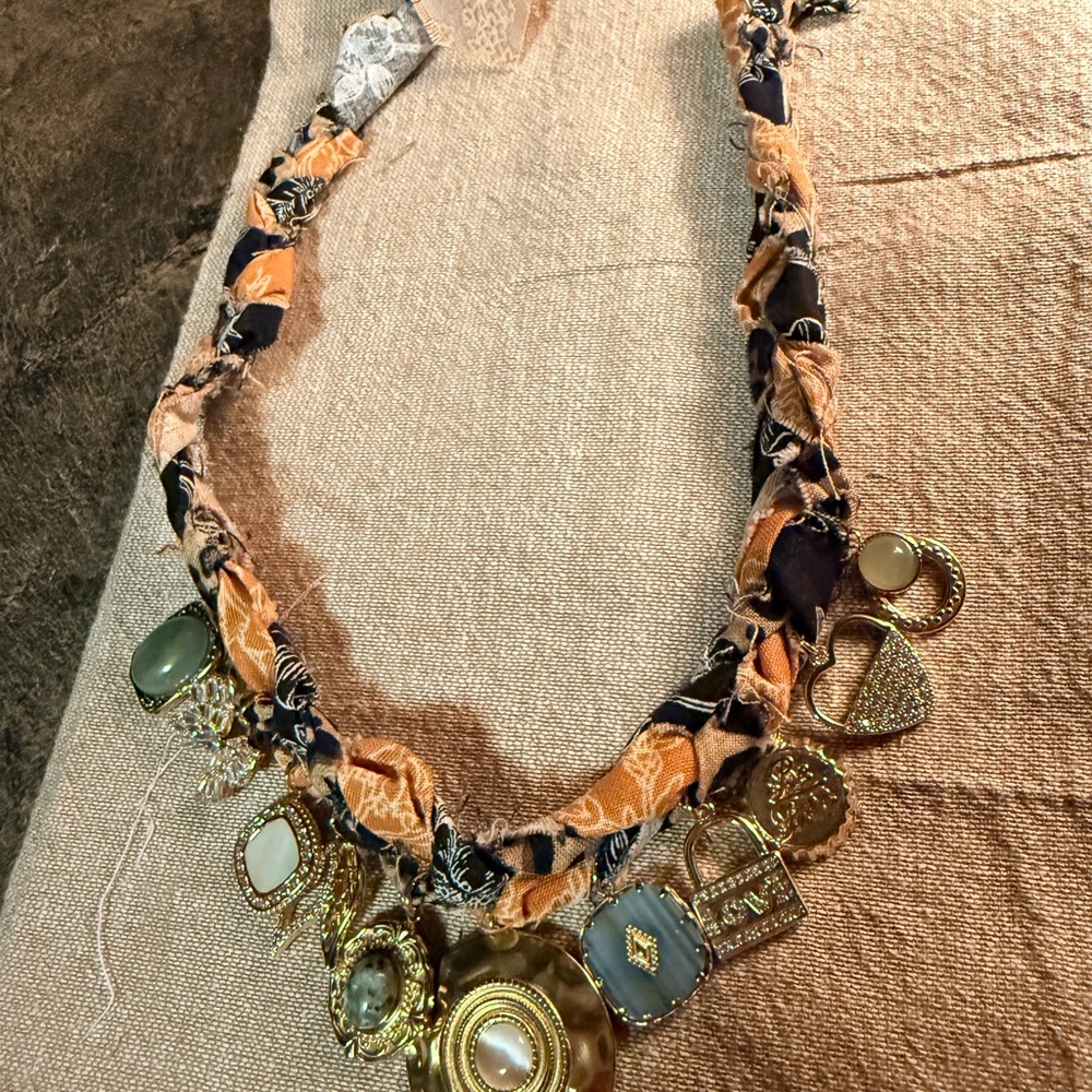 Brand new. Never worn. Bandana Bohemian Charm Necklace with Gold Accents